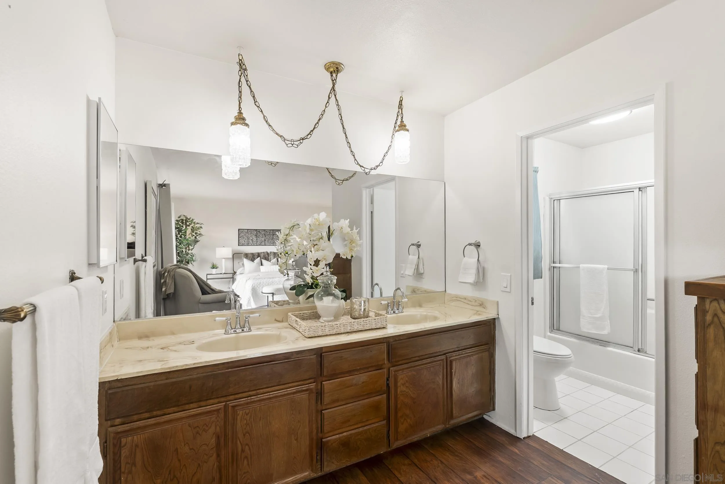 1429 Midway Drive Alpine, CA 91901 - Photo 29 of 42 a bathroom with a double vanity sink and a mirror