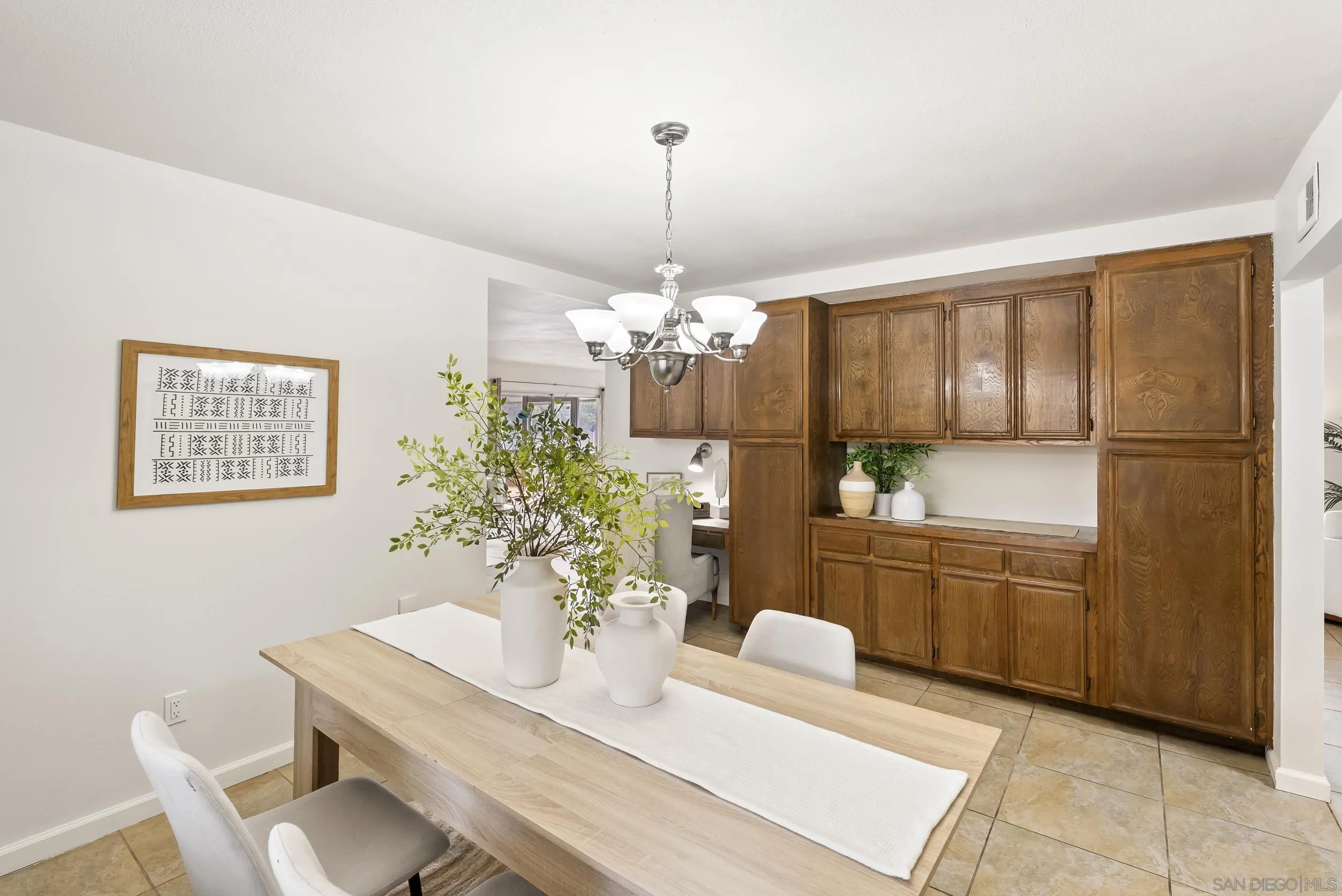 1429 Midway Drive Alpine, CA 91901 - Photo 7 of 42 a dining room with furniture a chandelier and window