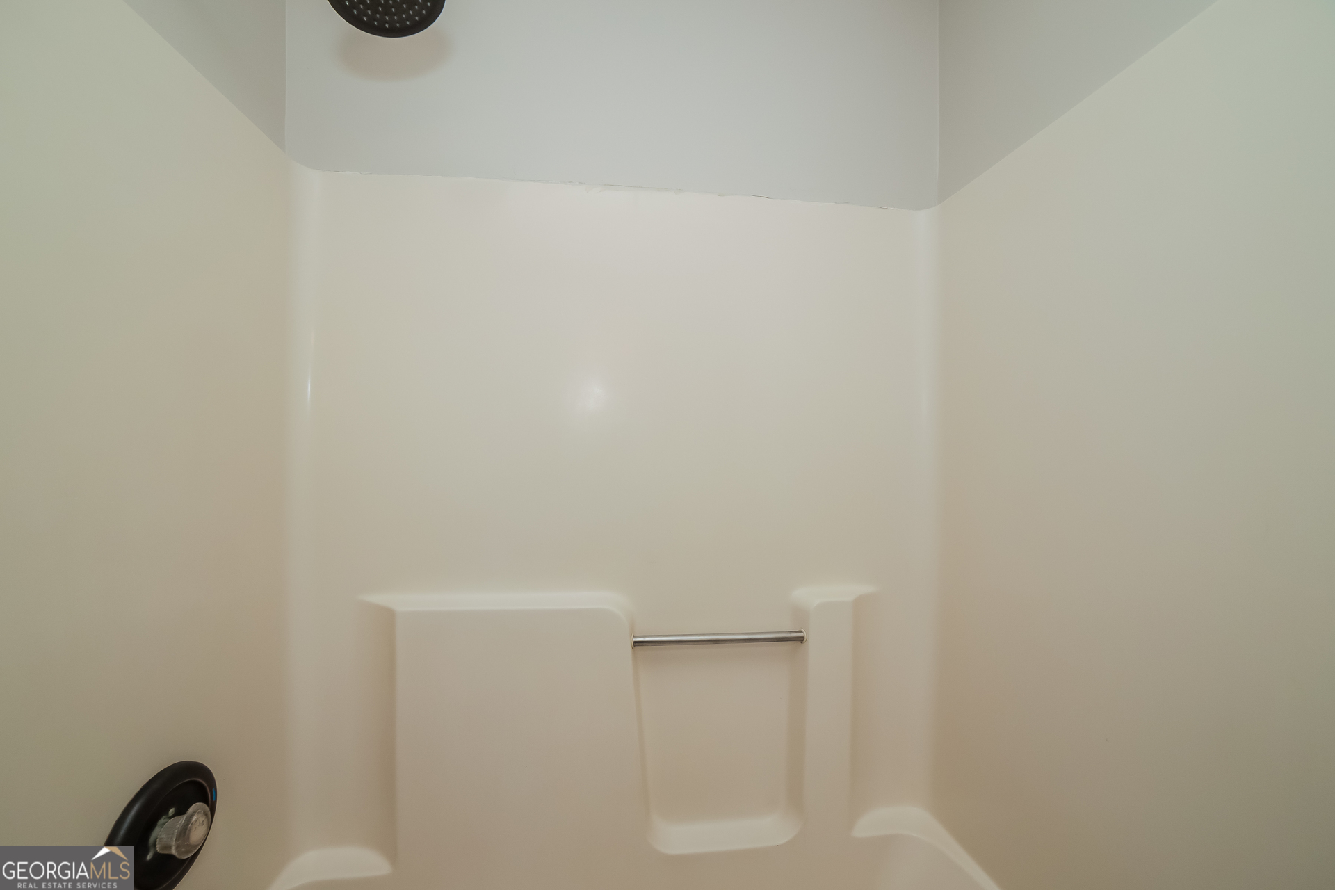 499 Woodland Street Dallas, GA 30157 - Photo 12 of 17 a close up view of shower