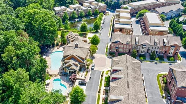 a view of a water fountain in front of a building