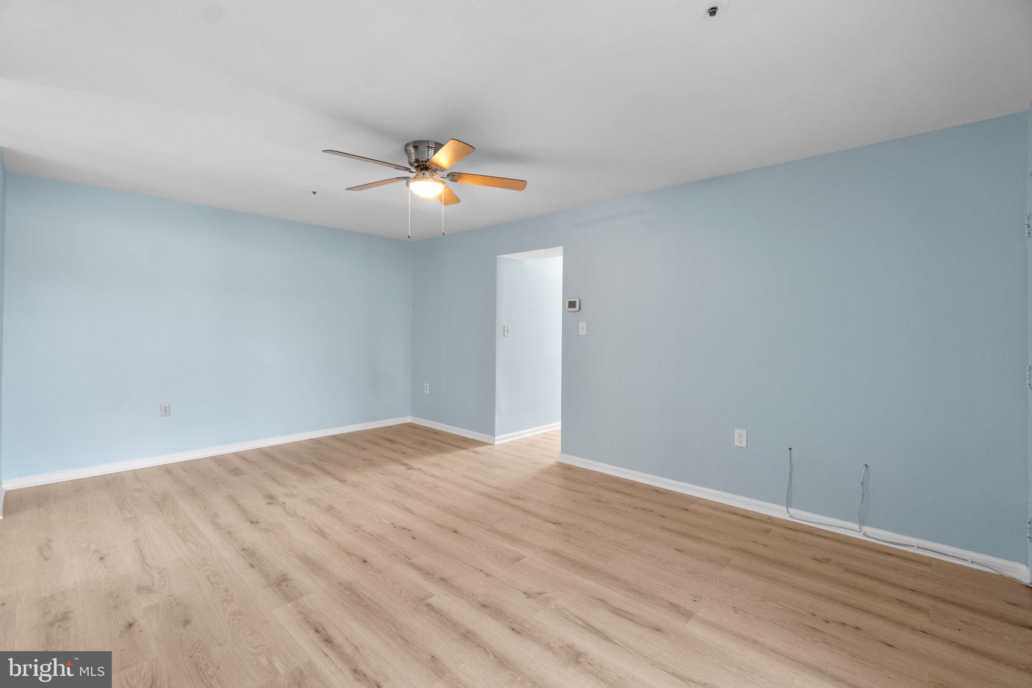 8378 Montgomery Run Road, Unit D Ellicott City, MD 21043 - Photo 10 of 30 a view of an empty room and window