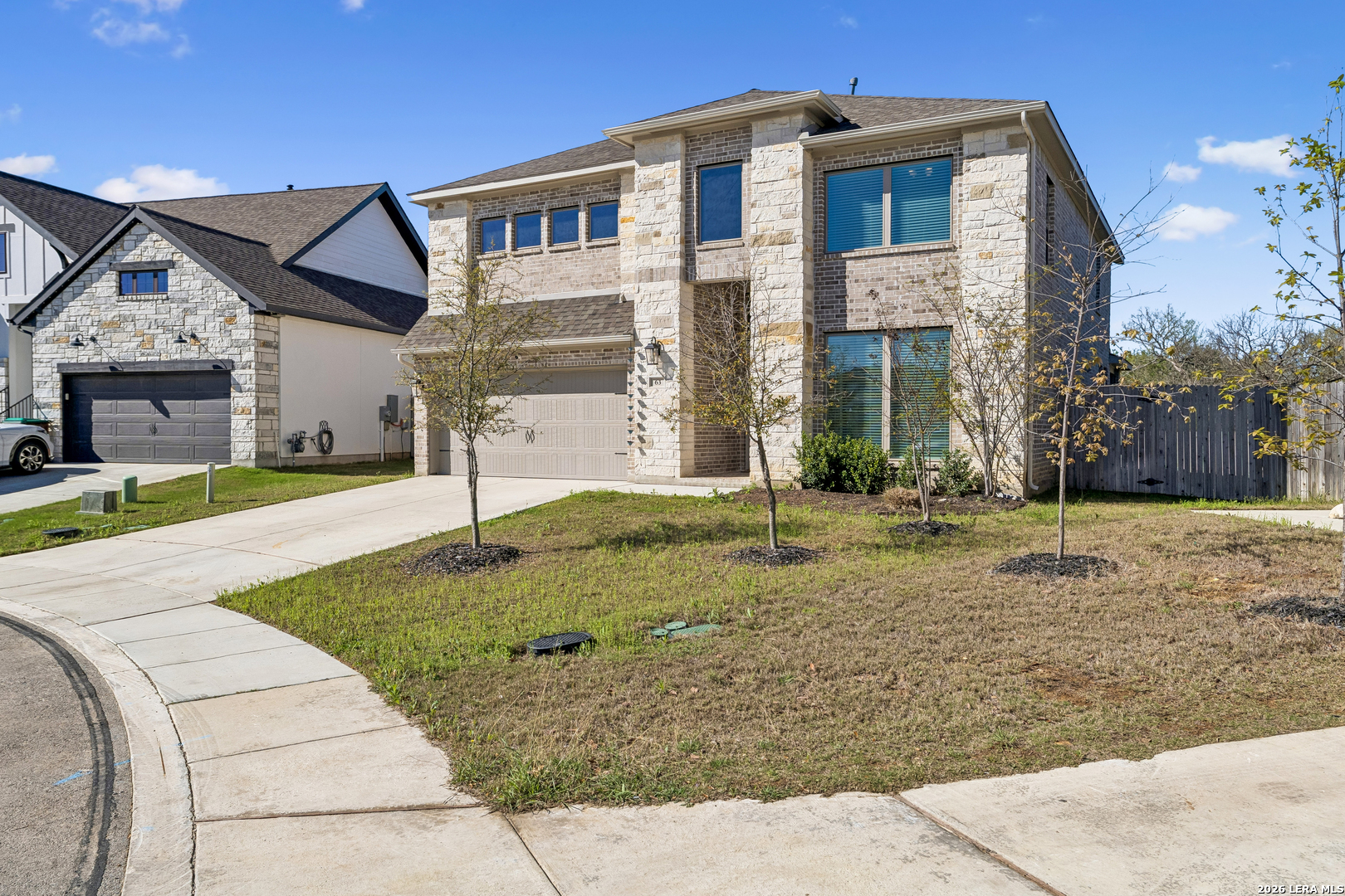 63 Ricadonna San Antonio, TX 78253 - Photo 2 of 43 a front view of a house with a yard