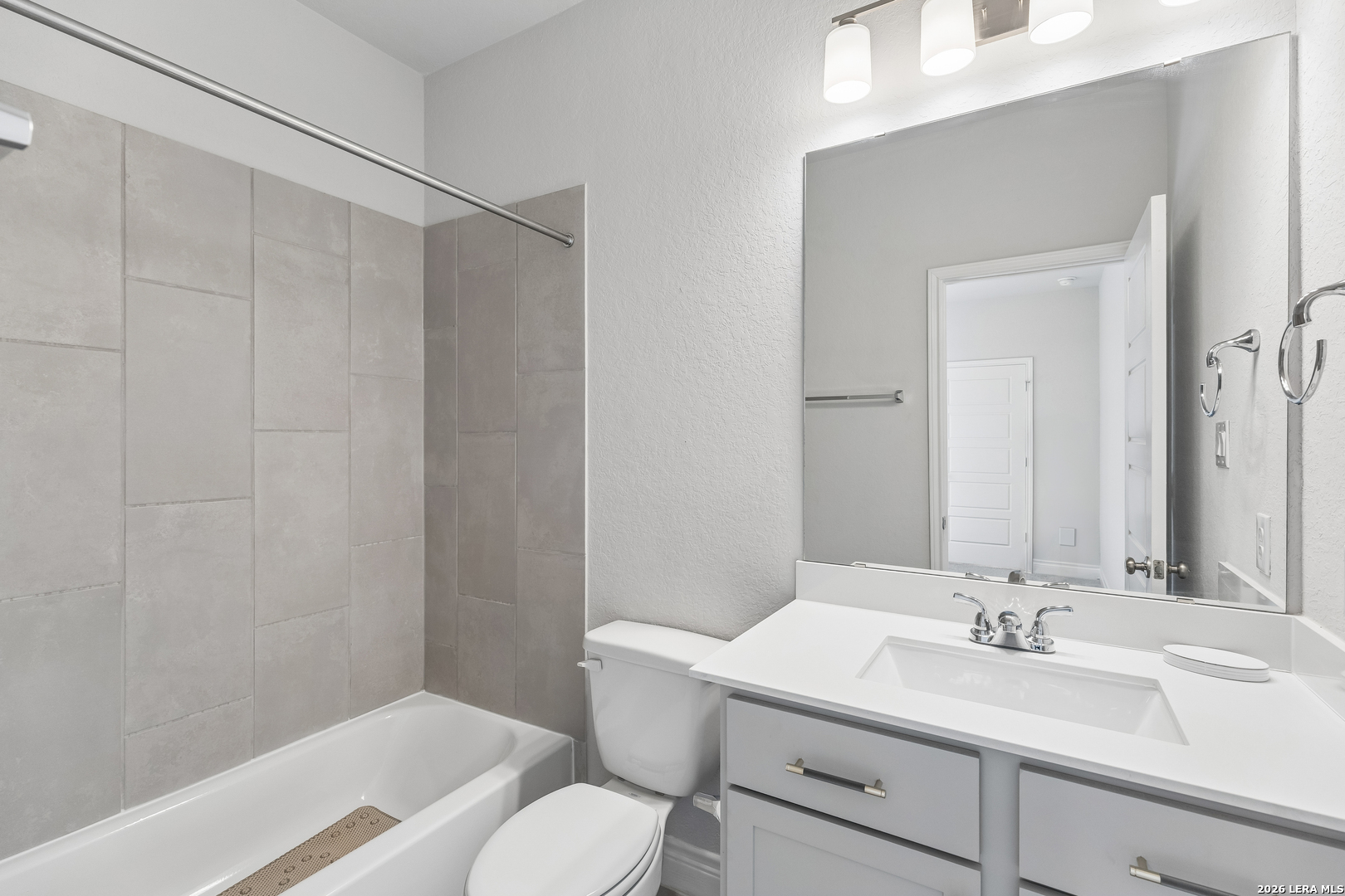 63 Ricadonna San Antonio, TX 78253 - Photo 23 of 43 a bathroom with a sink and a mirror