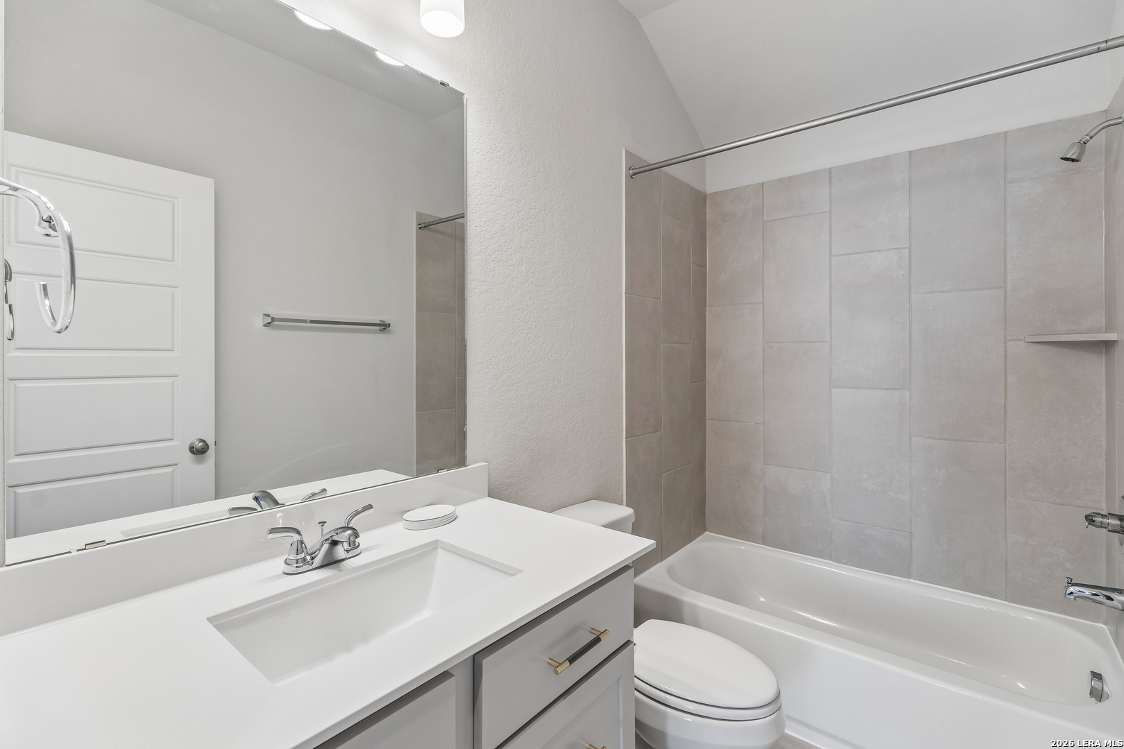 63 Ricadonna San Antonio, TX 78253 - Photo 25 of 43 a bathroom with a sink toilet vanity and shower