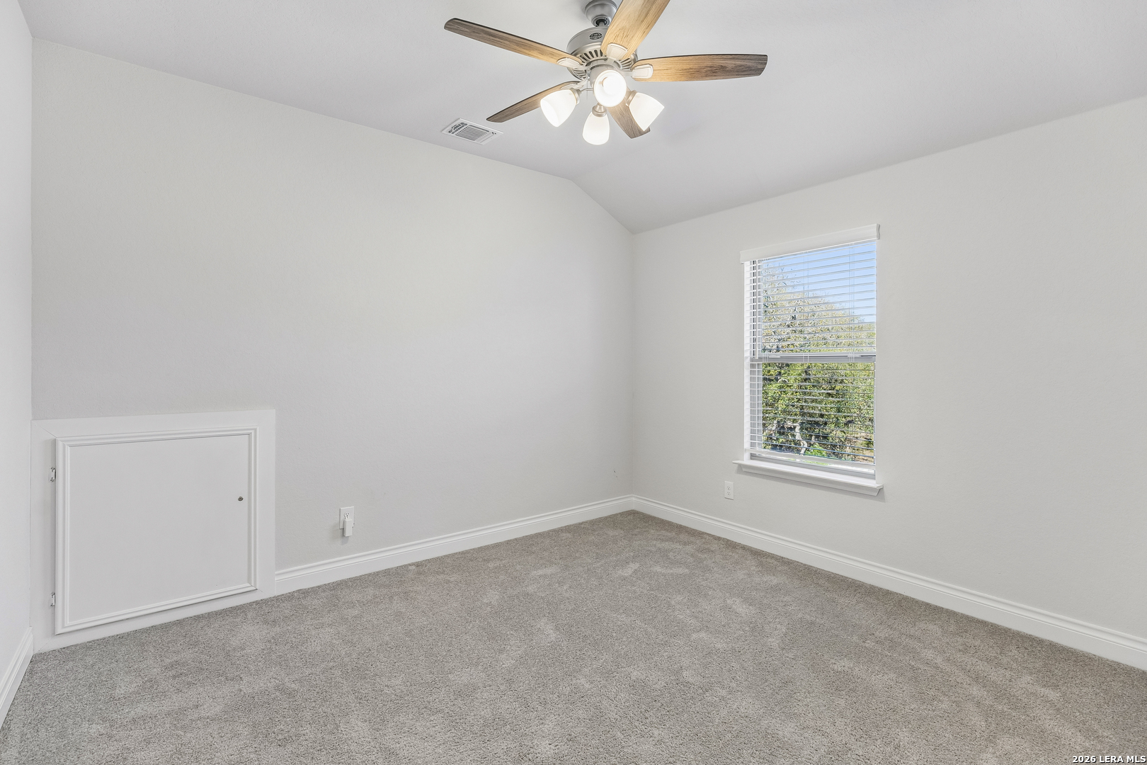 63 Ricadonna San Antonio, TX 78253 - Photo 27 of 43 an empty room with a window and a fan
