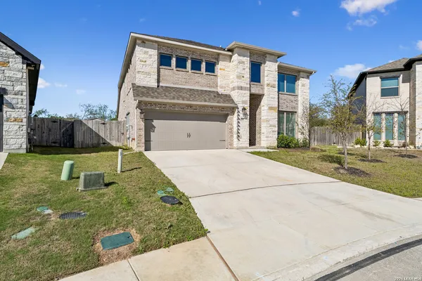 a house view with a garden space