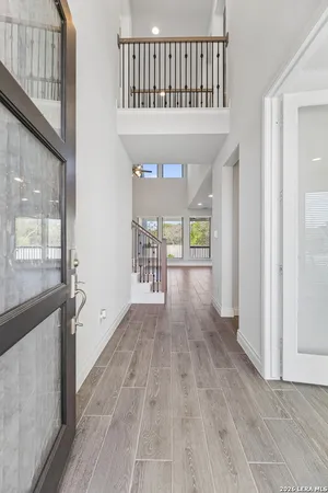 a view of entryway with wooden floor