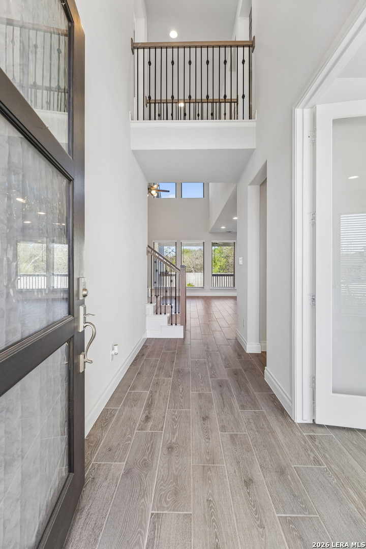63 Ricadonna San Antonio, TX 78253 - Photo 5 of 43 a view of entryway with wooden floor