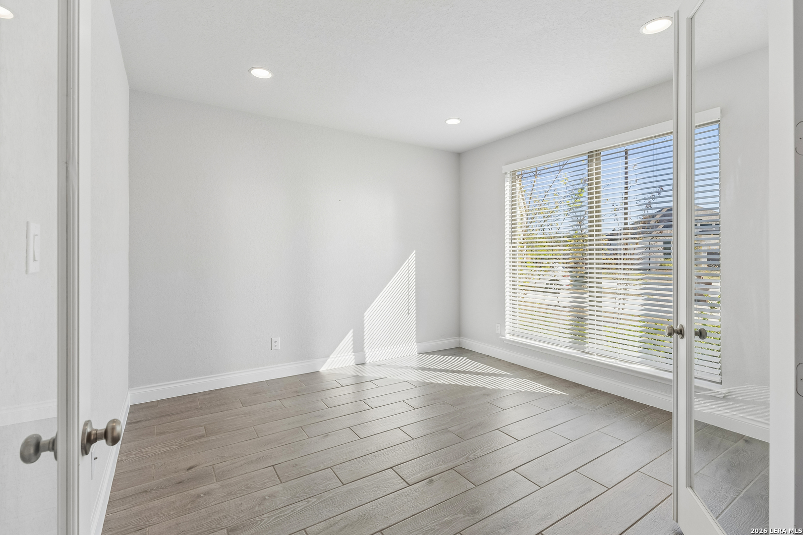 63 Ricadonna San Antonio, TX 78253 - Photo 6 of 43 a view of an empty room with a window