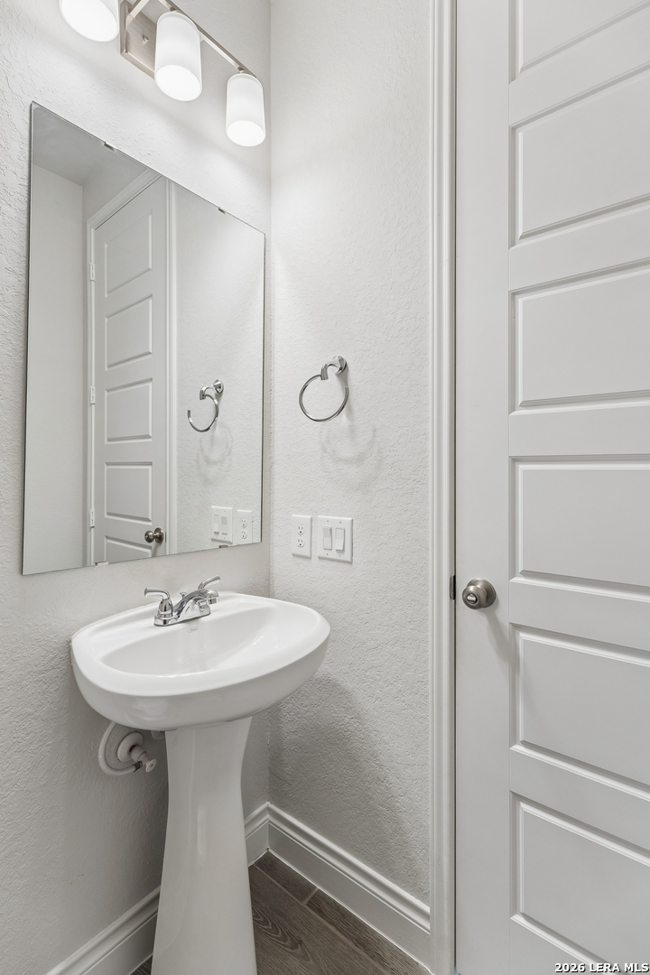 63 Ricadonna San Antonio, TX 78253 - Photo 8 of 43 a bathroom with a sink and mirror