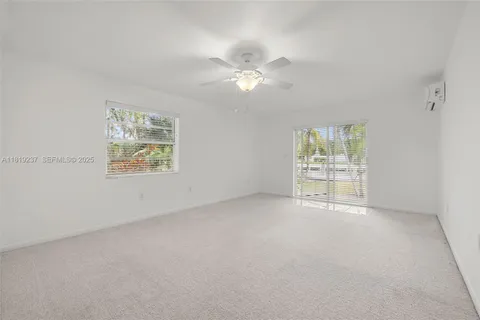 an empty room with a bathroom