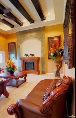 a bedroom with furniture and a flat screen tv