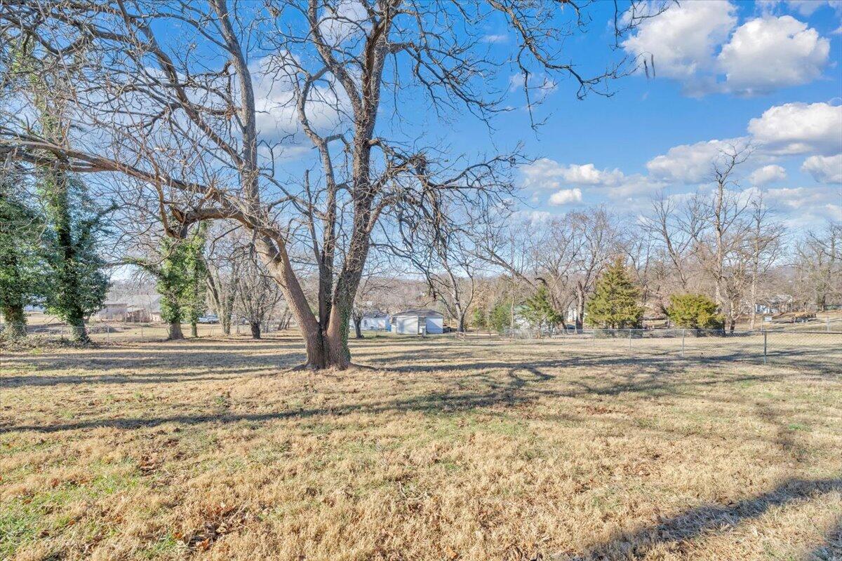 2624 Radford Road Northeast Roanoke, VA 24012 - Photo 26 of 55 a view of a yard and trees