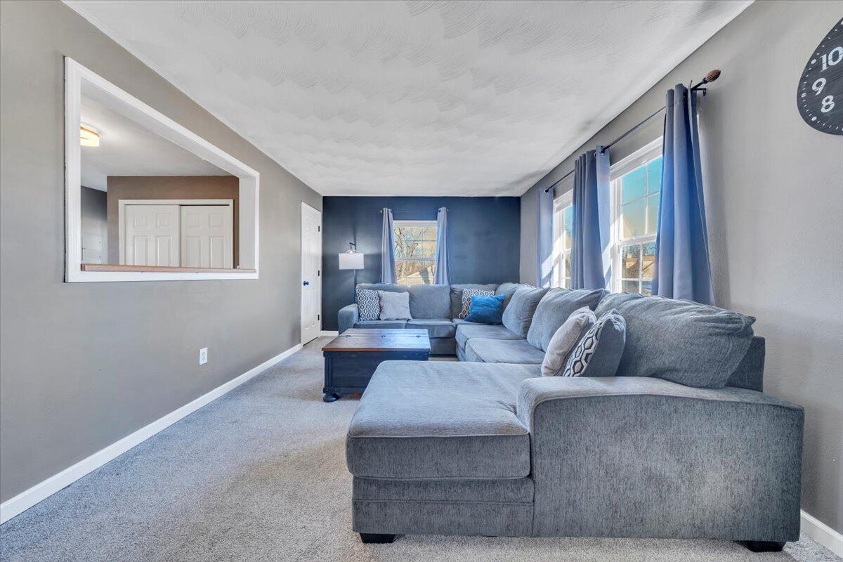 2624 Radford Road Northeast Roanoke, VA 24012 - Photo 3 of 55 a living room with furniture and a window
