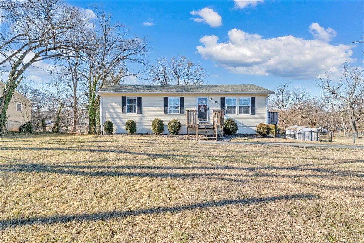 2624 Radford Road Northeast Roanoke, VA 24012 - Photo 36 of 55 a view of a house with a yard