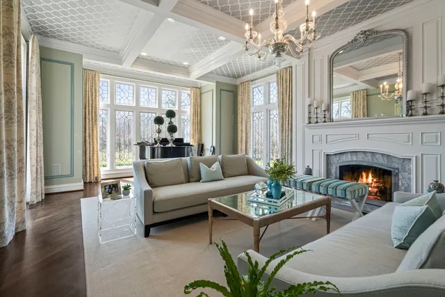 a kitchen with granite countertop a stove a sink and a shower
