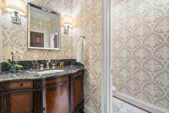 a utility room with sink dryer and washer