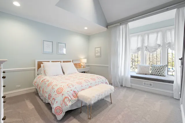 a bedroom with furniture and a couch