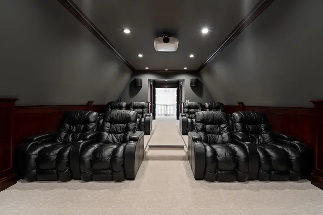 a view of a swimming pool with a patio and a garden