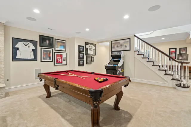 a view of a patio with couches table and chairs and potted plants