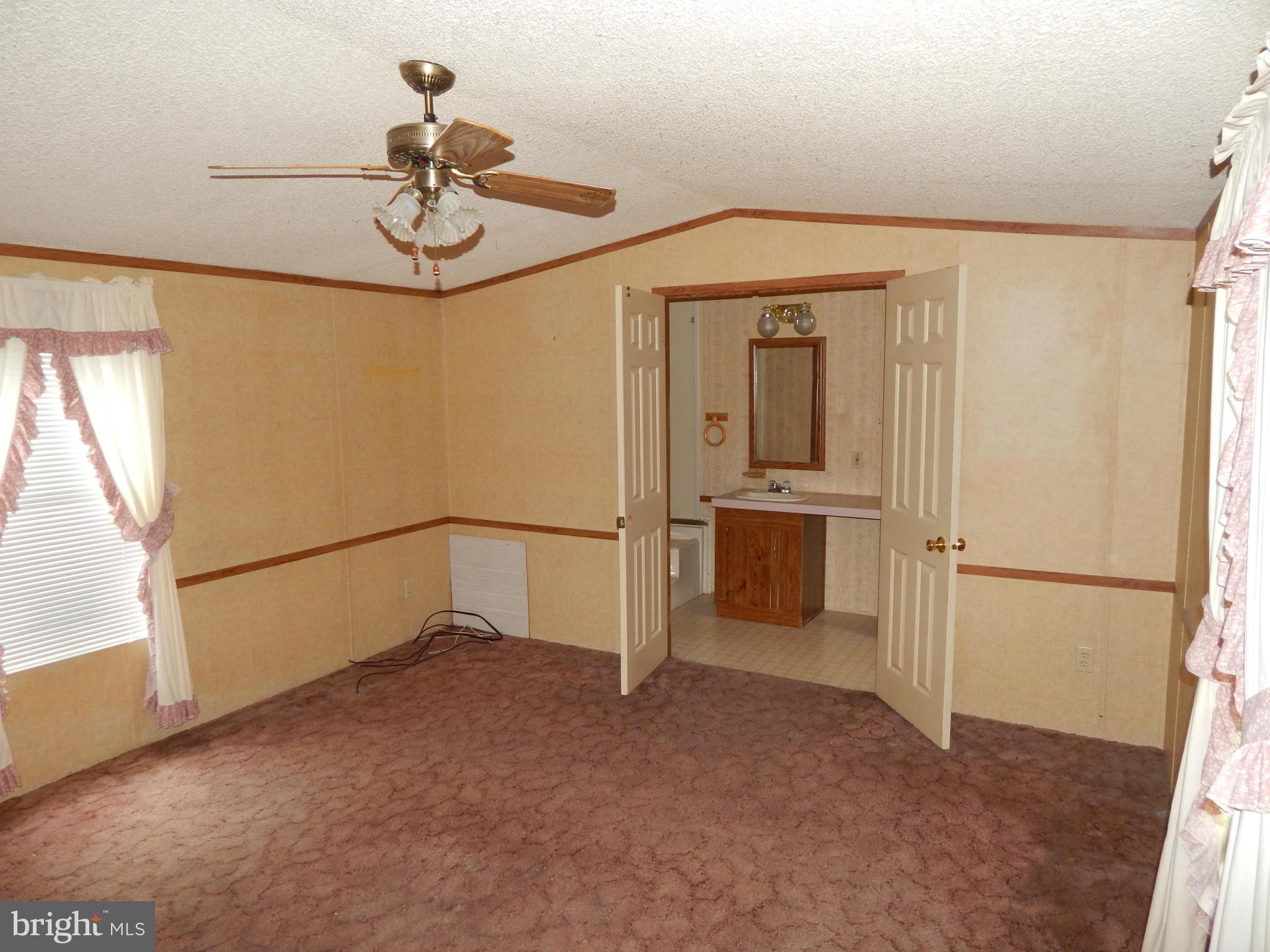 189 Washington Street Inwood, WV 25428 - Photo 17 of 30 a view of a livingroom with a staircase