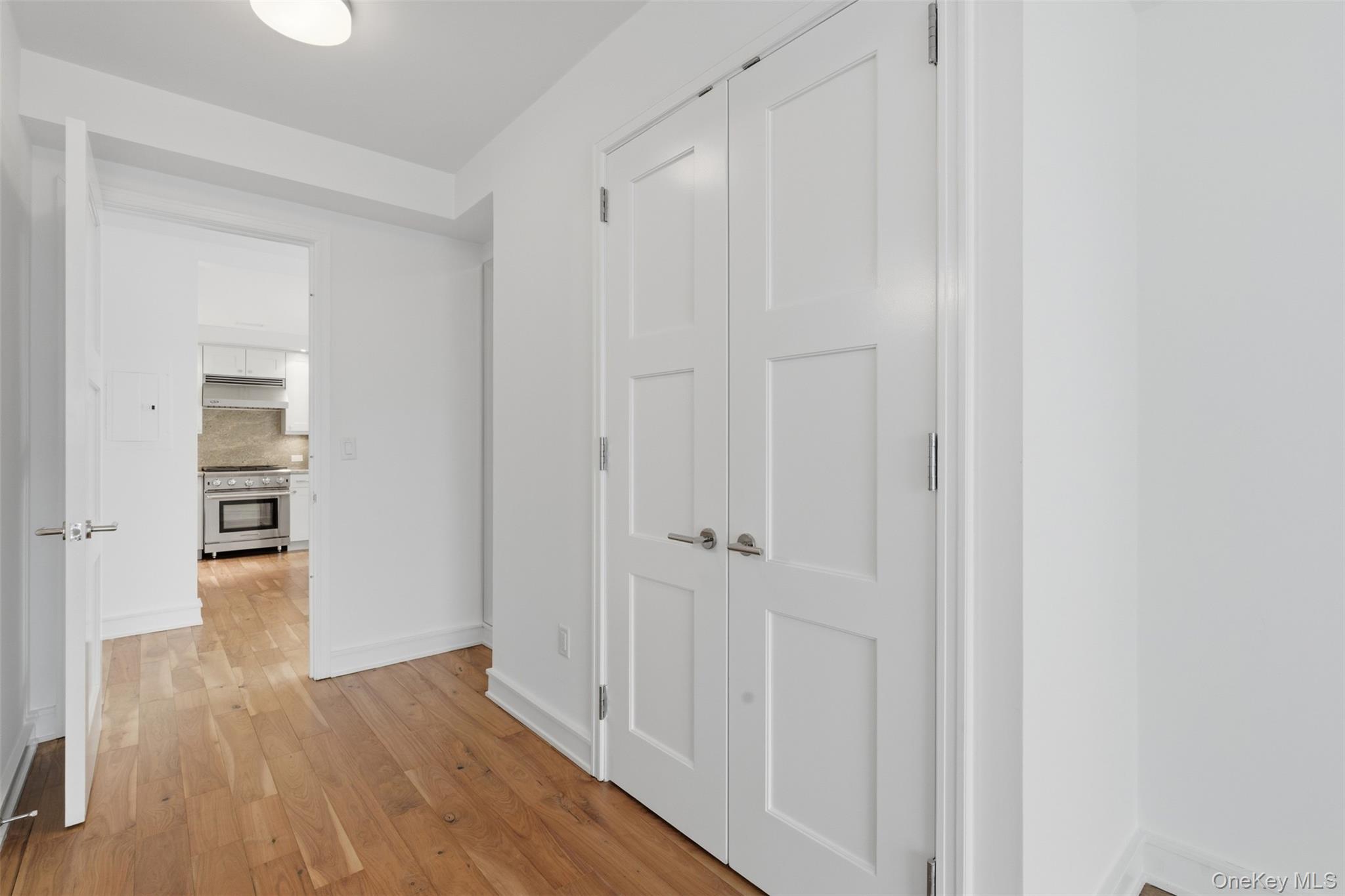 5 Renaissance Square, Unit 16D White Plains, NY 10601 - Photo 14 of 29 a view of a room with wooden floor