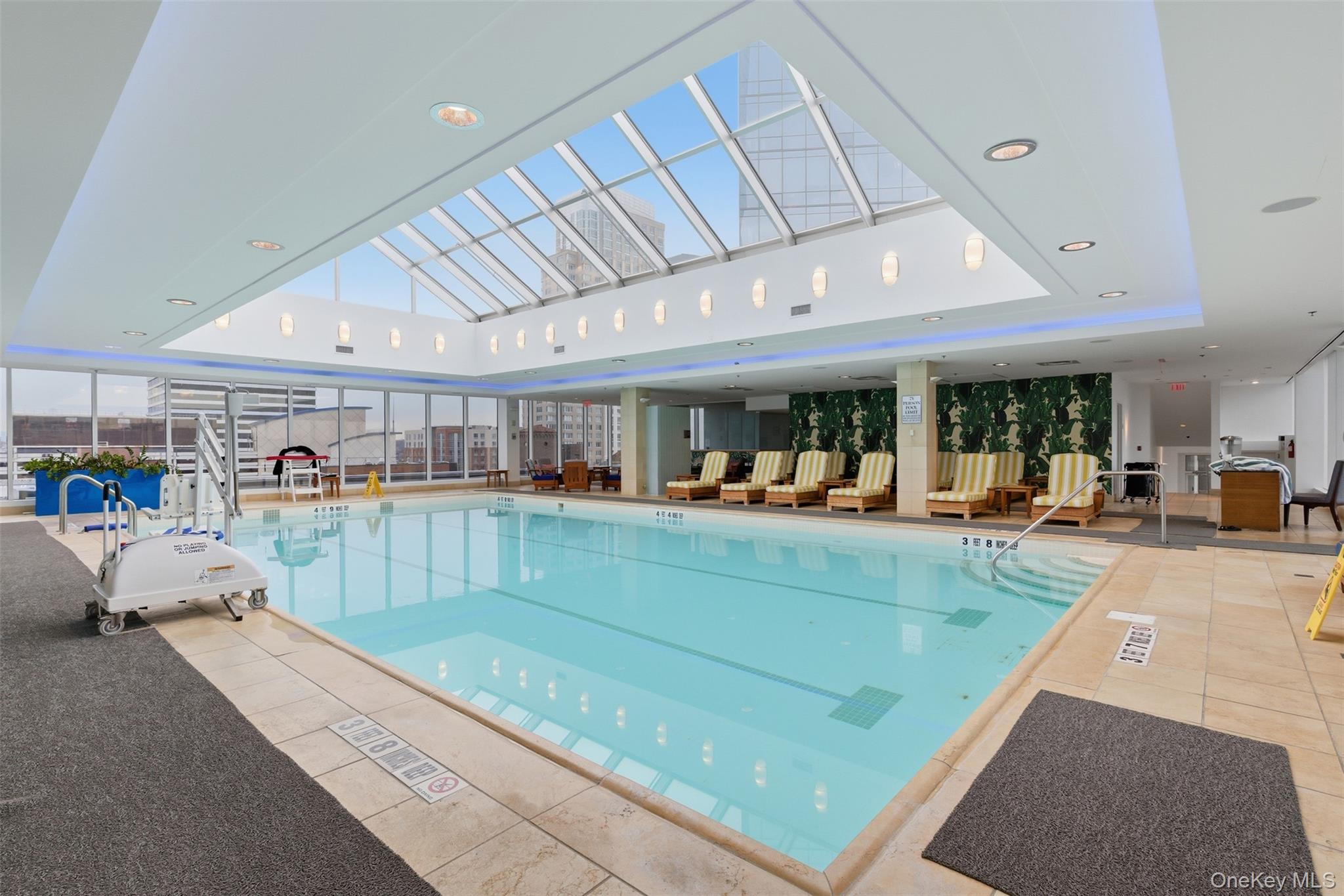5 Renaissance Square, Unit 16D White Plains, NY 10601 - Photo 29 of 36 a view of a living room and kitchen