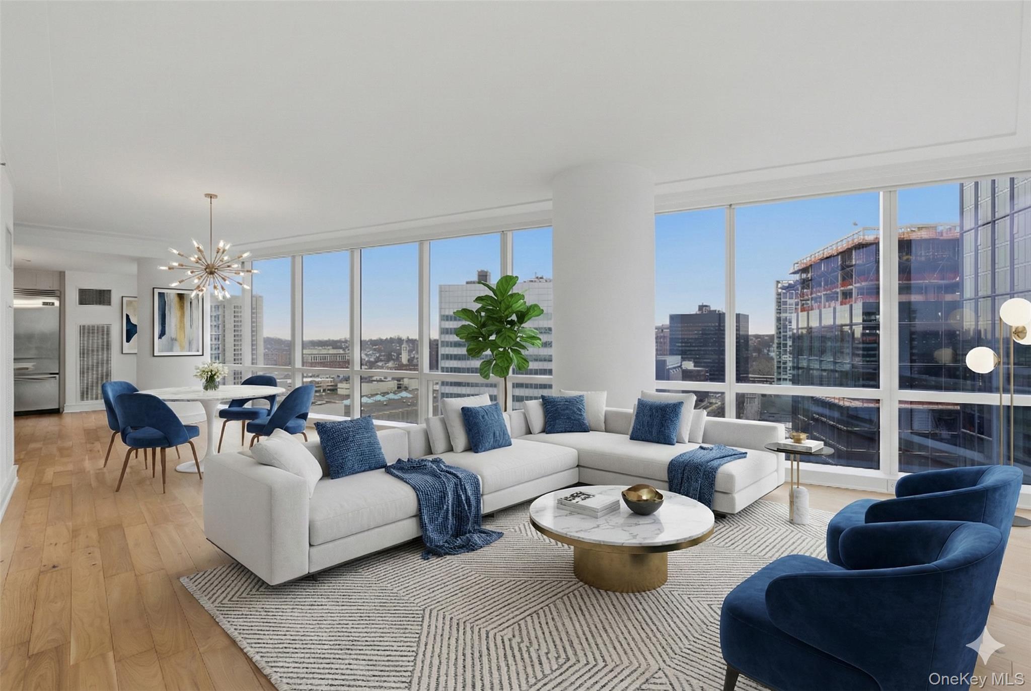 5 Renaissance Square, Unit 16D White Plains, NY 10601 - Photo 3 of 29 a living room with furniture and a large window