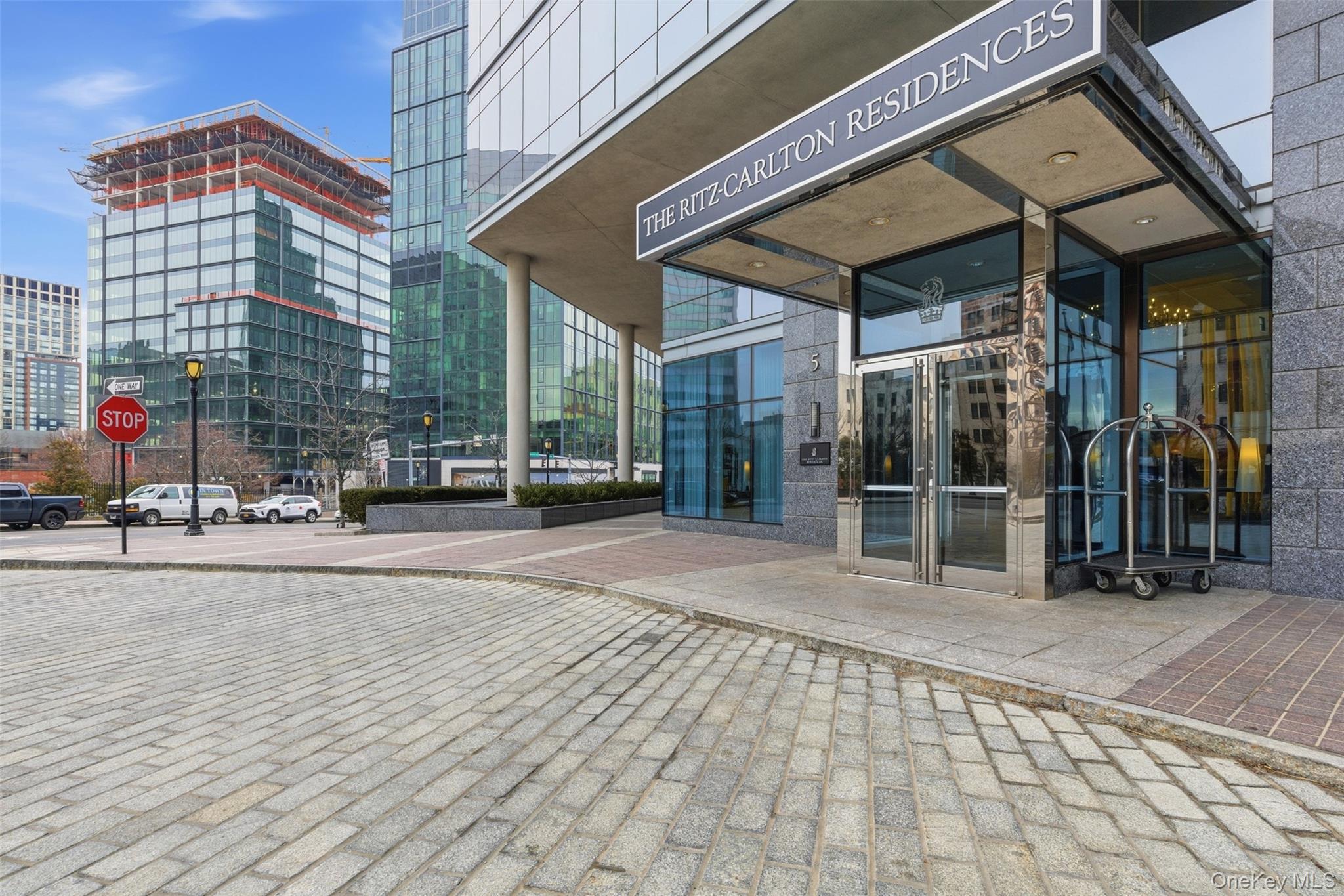 5 Renaissance Square, Unit 16D White Plains, NY 10601 - Photo 35 of 36 a building exterior with furniture