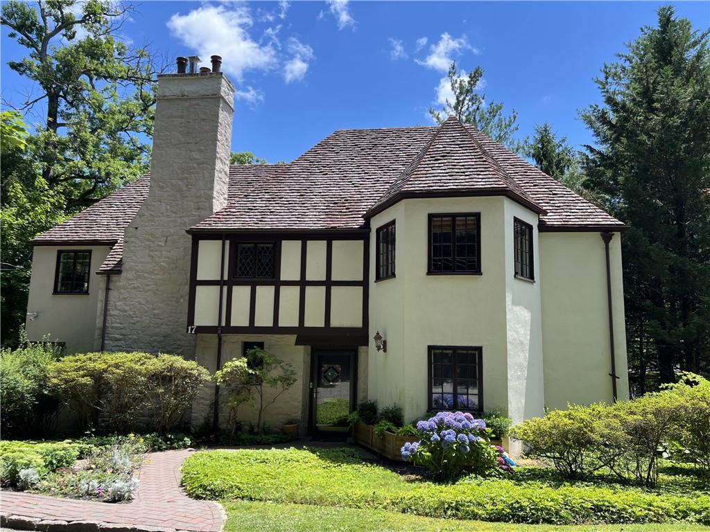 Impressive 1927-built Edgemont Tudor, only a short walk to downtown Scarsdale shops and Metro North train station for a 30 minute commute to Grand Central Station.  Owned and beautifully maintained by a local architect, this house boasts high-quality craftsmanship and exquisite original details including an original Ludowici tile roof.