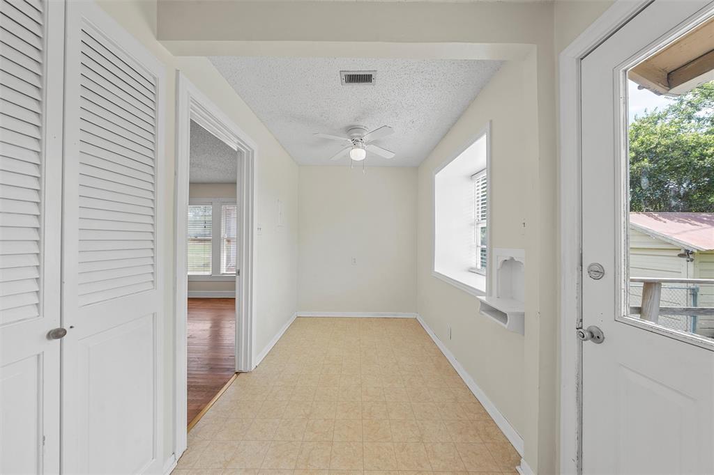 2601 Proctor Avenue Waco, TX 76708 - Photo 13 of 28 a view of a hallway with a window and a livingroom