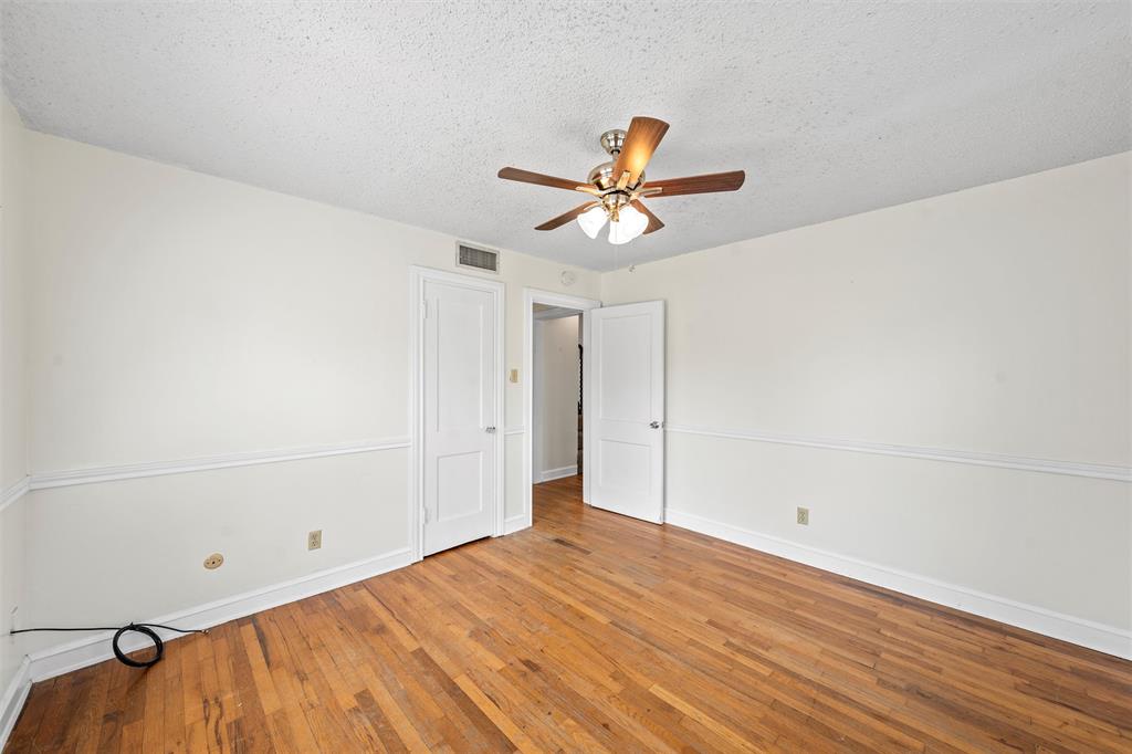 2601 Proctor Avenue Waco, TX 76708 - Photo 14 of 28 a view of a room with a wooden floor