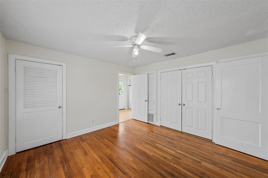 2601 Proctor Avenue Waco, TX 76708 - Photo 17 of 28 wooden floor in an empty room