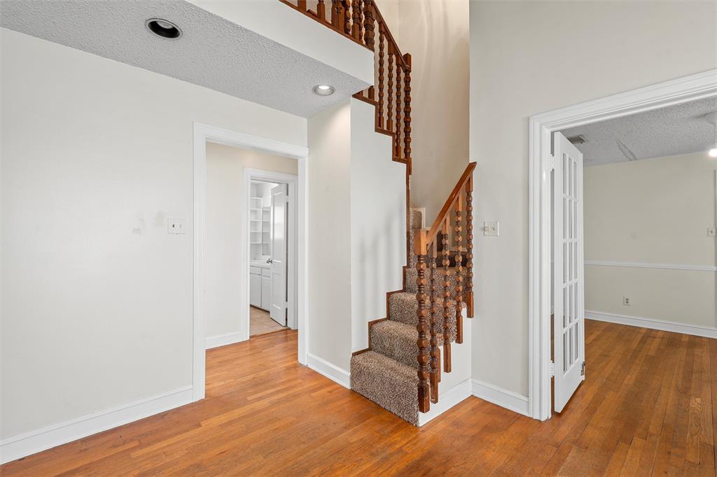 2601 Proctor Avenue Waco, TX 76708 - Photo 6 of 28 a view of an entryway with wooden floor