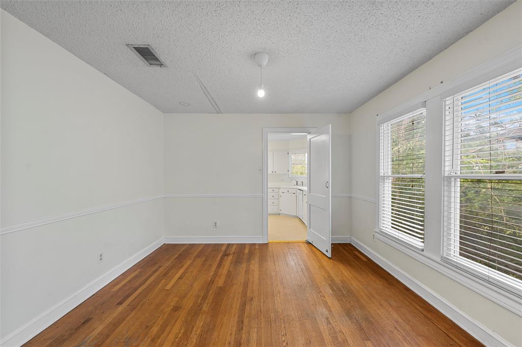 2601 Proctor Avenue Waco, TX 76708 - Photo 9 of 28 a view of empty room with wooden floor and fan