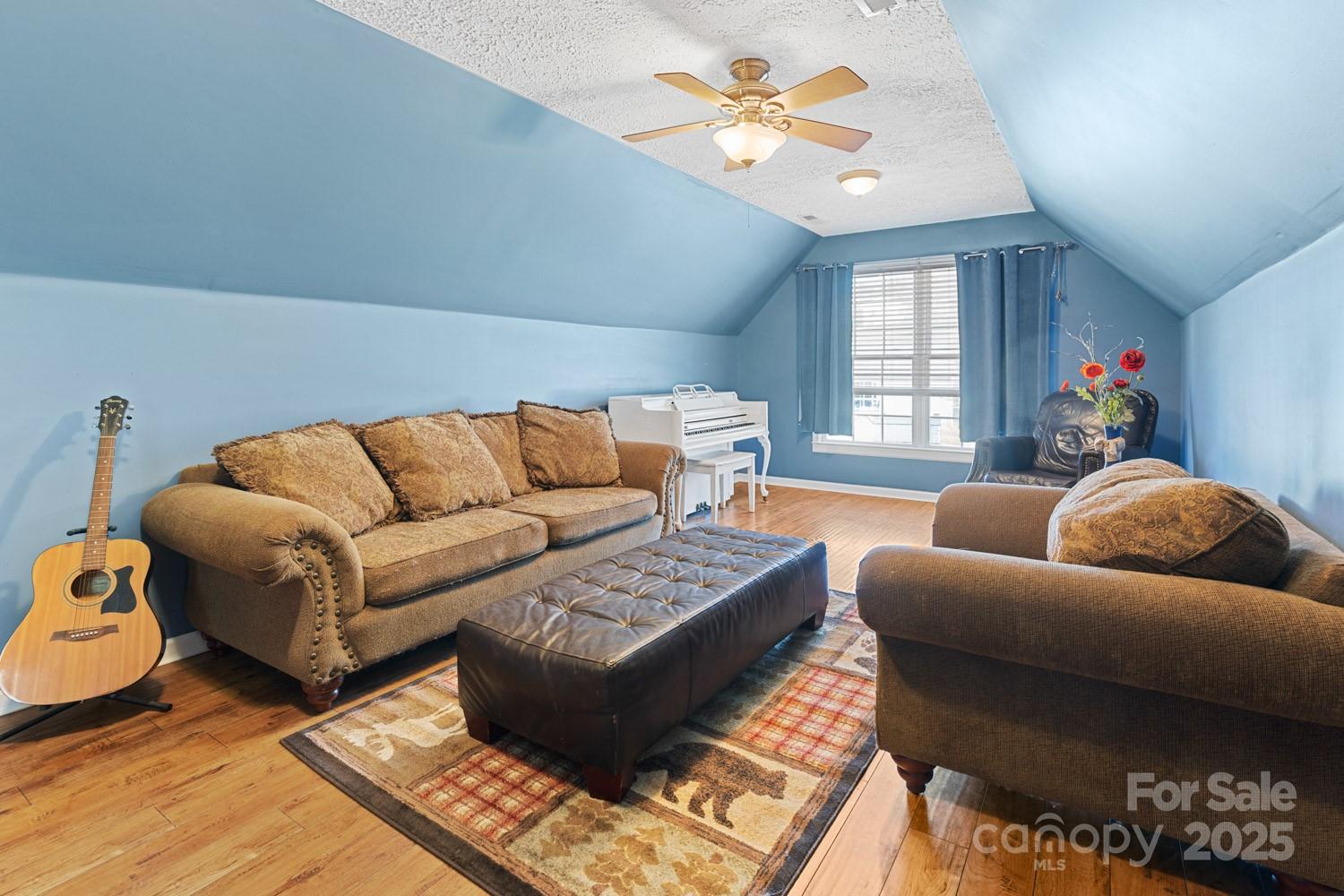 122 Ramsey Road Asheville, NC 28806 - Photo 14 of 19 a living room with furniture a rug and a window