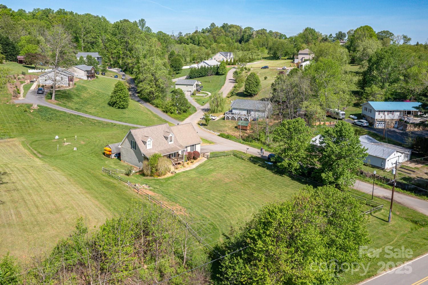122 Ramsey Road Asheville, NC 28806 - Photo 19 of 19 an aerial view of a house with a yard basket ball court and outdoor seating