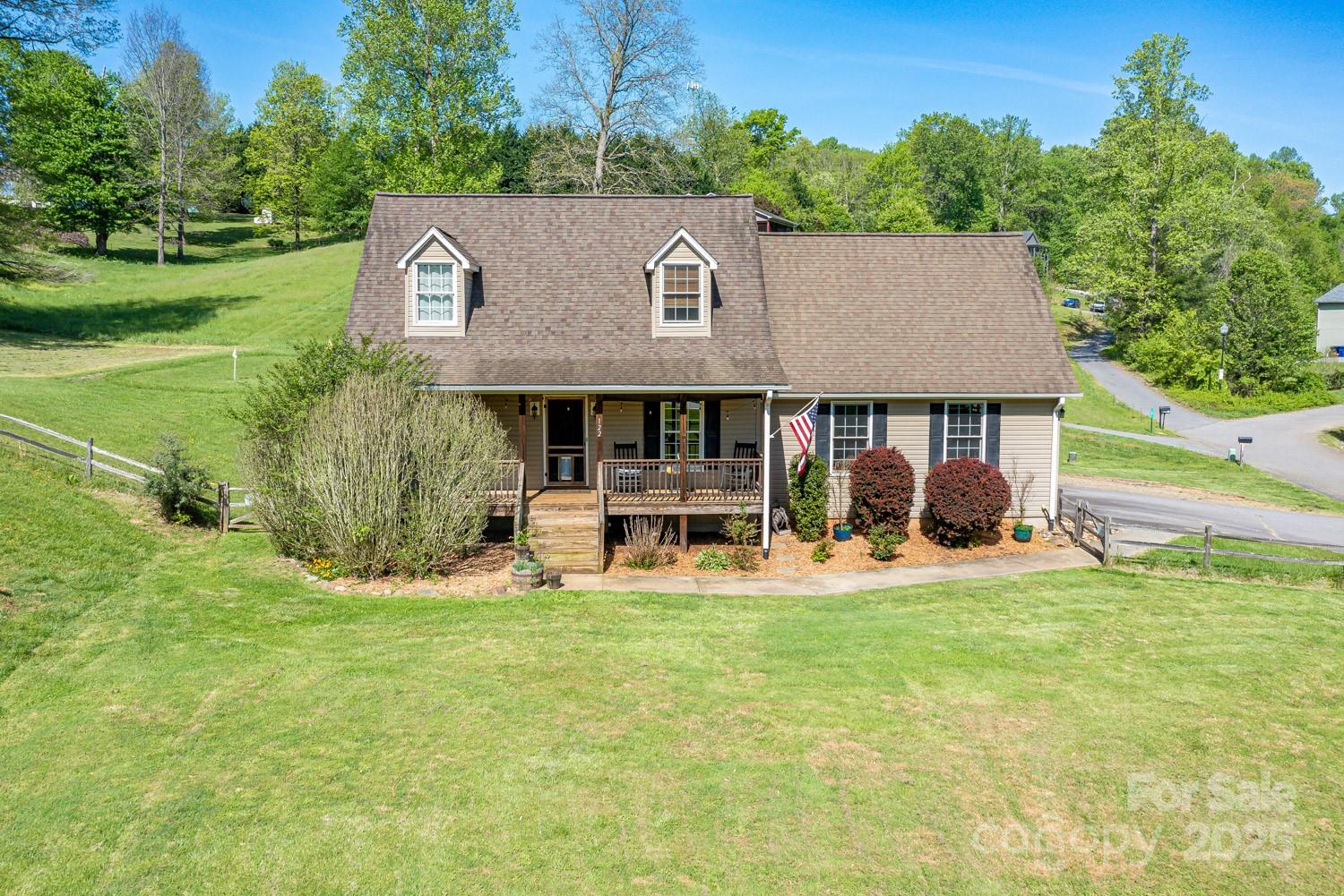 122 Ramsey Road Asheville, NC 28806 - Photo 3 of 19 a front view of a house with a yard