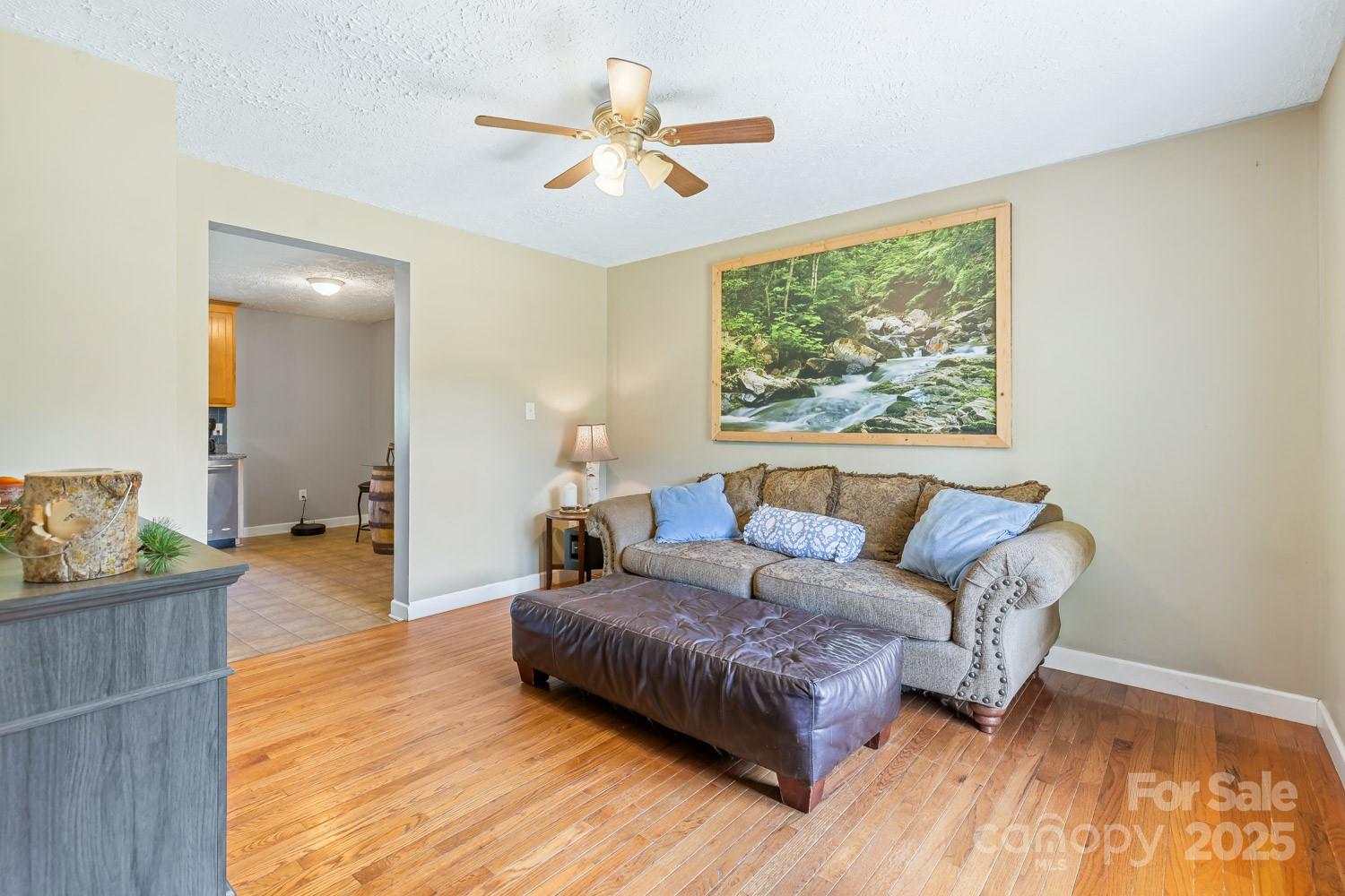 122 Ramsey Road Asheville, NC 28806 - Photo 5 of 19 a living room with furniture and a large window