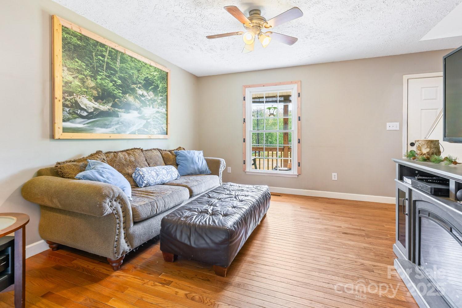 122 Ramsey Road Asheville, NC 28806 - Photo 6 of 19 a living room with furniture and a window