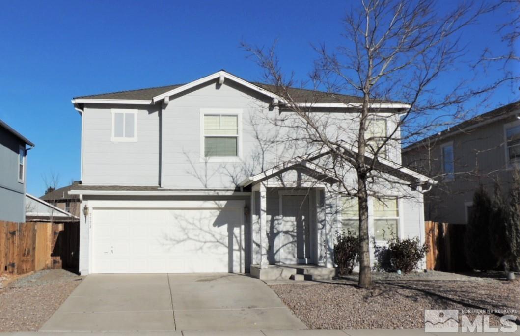 7723 Corso Street Reno, NV 89506 - Photo 1 of 19 a front view of a house with a yard