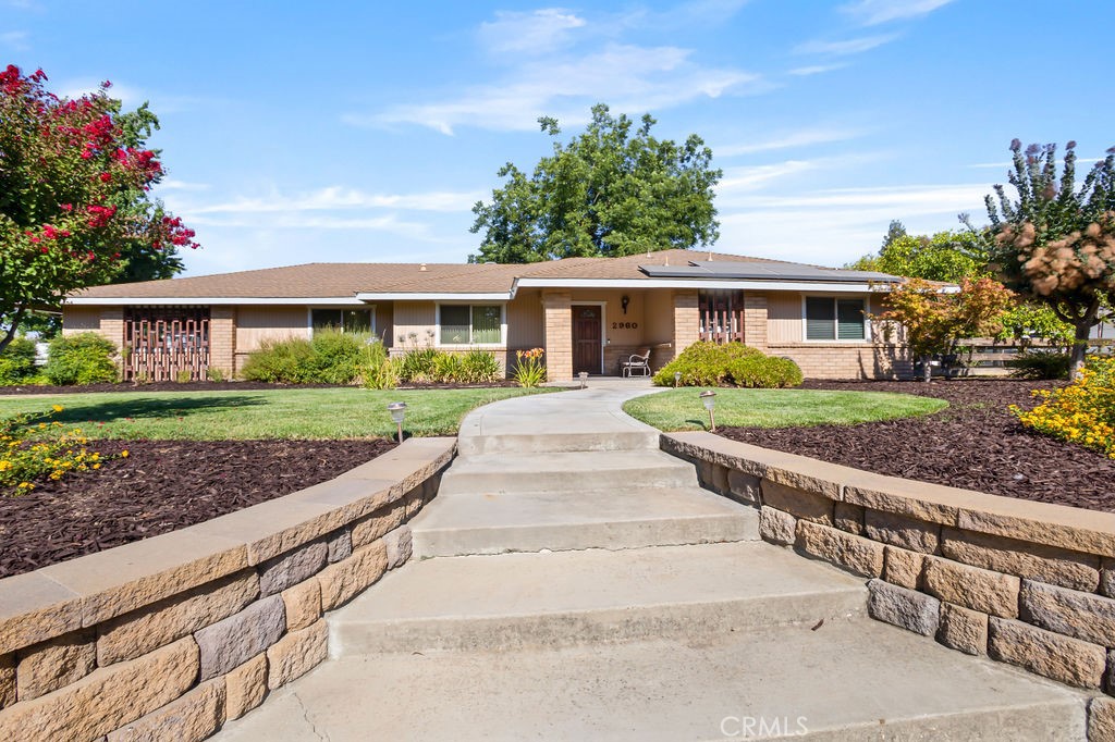 2960 Whitegate Drive Merced, CA 95340 - Photo 14 of 48 a view of house with a yard and potted plants
