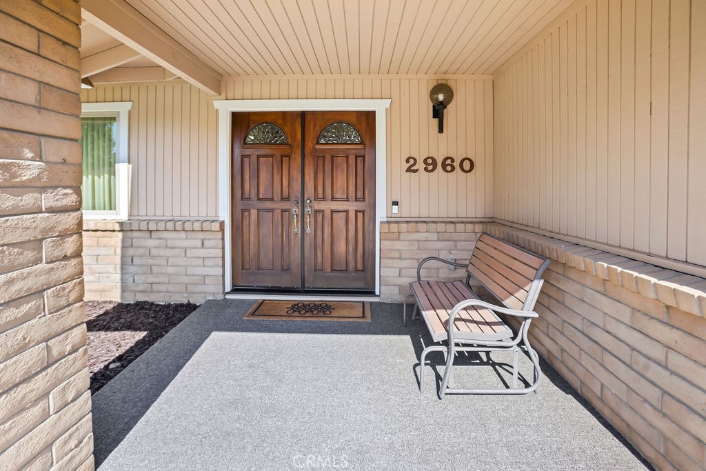 2960 Whitegate Drive Merced, CA 95340 - Photo 16 of 48 a view of wooden bench in front of door