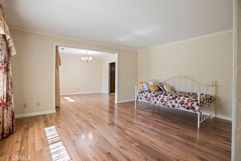 2960 Whitegate Drive Merced, CA 95340 - Photo 19 of 48 a view of a room with wooden floor lounge chair and windows