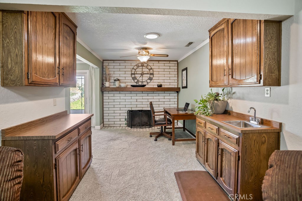 2960 Whitegate Drive Merced, CA 95340 - Photo 23 of 48 a kitchen with furniture a stove and a refrigerator