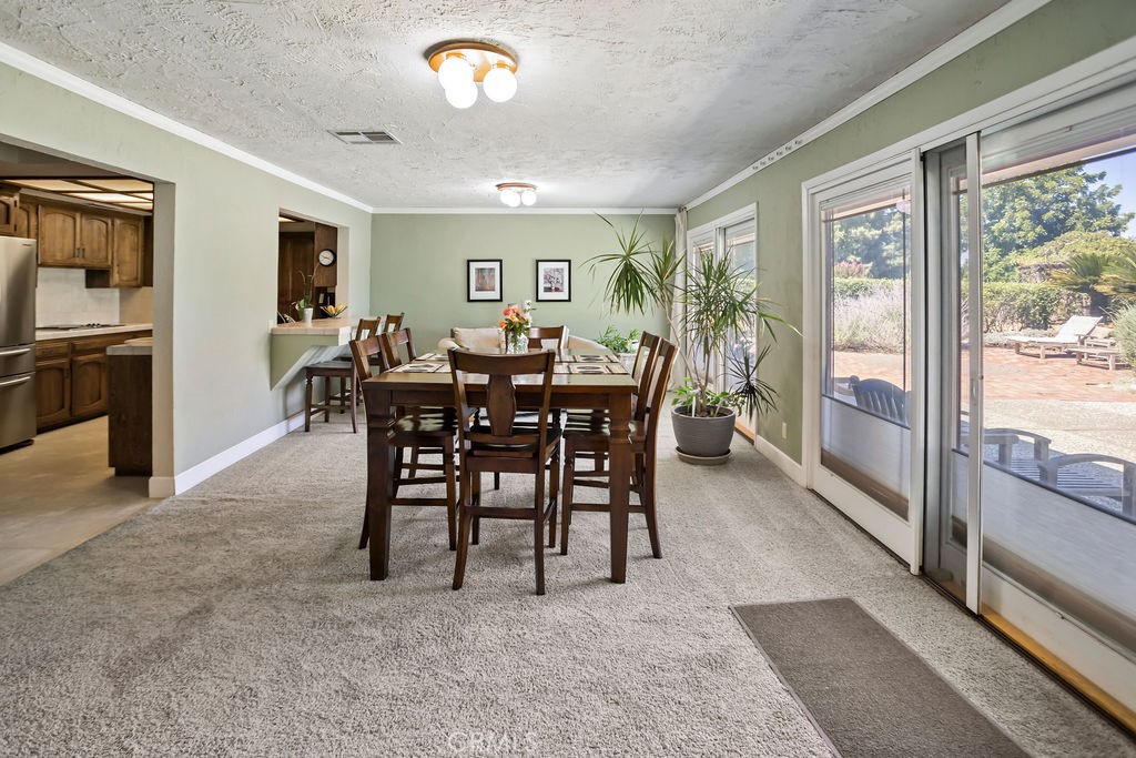 2960 Whitegate Drive Merced, CA 95340 - Photo 29 of 48 a view of a dining room with furniture window and outside view