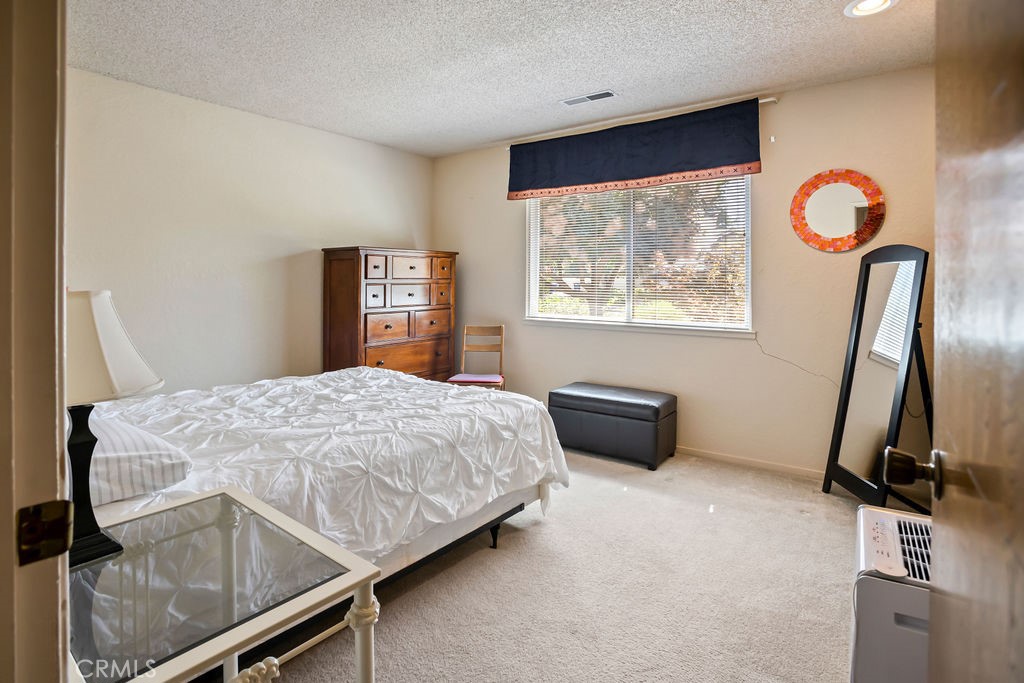 2960 Whitegate Drive Merced, CA 95340 - Photo 35 of 48 a bedroom with a bed and dresser