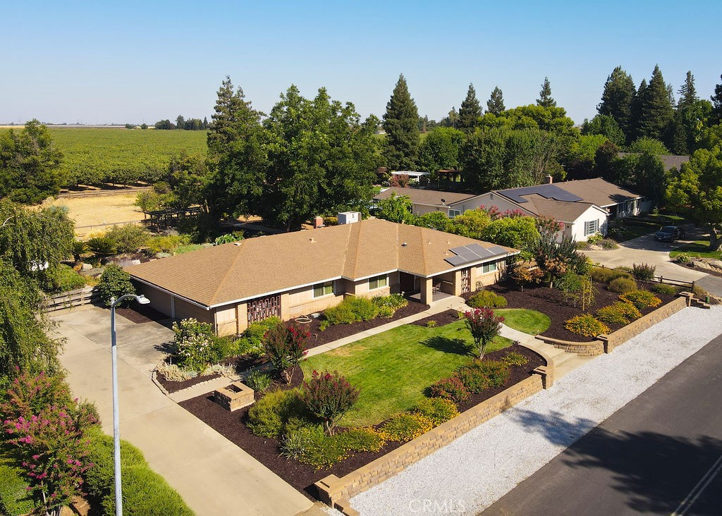 2960 Whitegate Drive Merced, CA 95340 - Photo 6 of 48 an aerial view of house with yard and mountain view in back