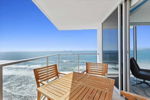 a kitchen with granite countertop a sink stove and refrigerator
