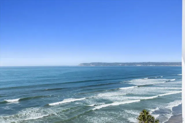 a bathroom with a sink a mirror and a shower
